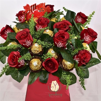 Dozen roses with half dozen Ferrero Rocher stems